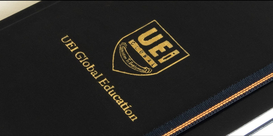 logo : gold + blind embossing - UEI GLOBAL corporate gift
