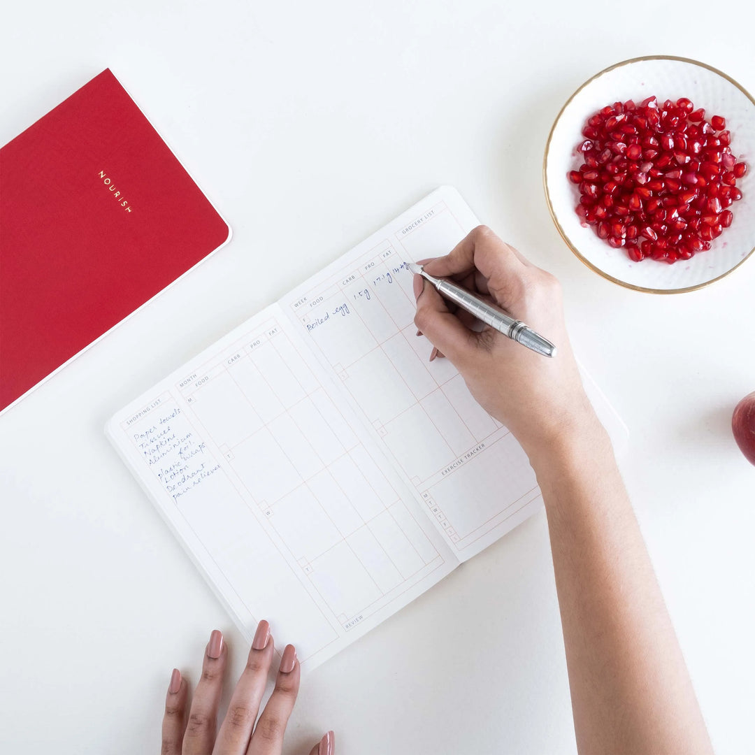 Neorah wellness journal to help you get motivated and lose those extra pounds. This journal notebook diary can track your weight and record everything you eat.